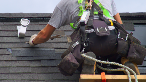 man installing new roof in Raleigh